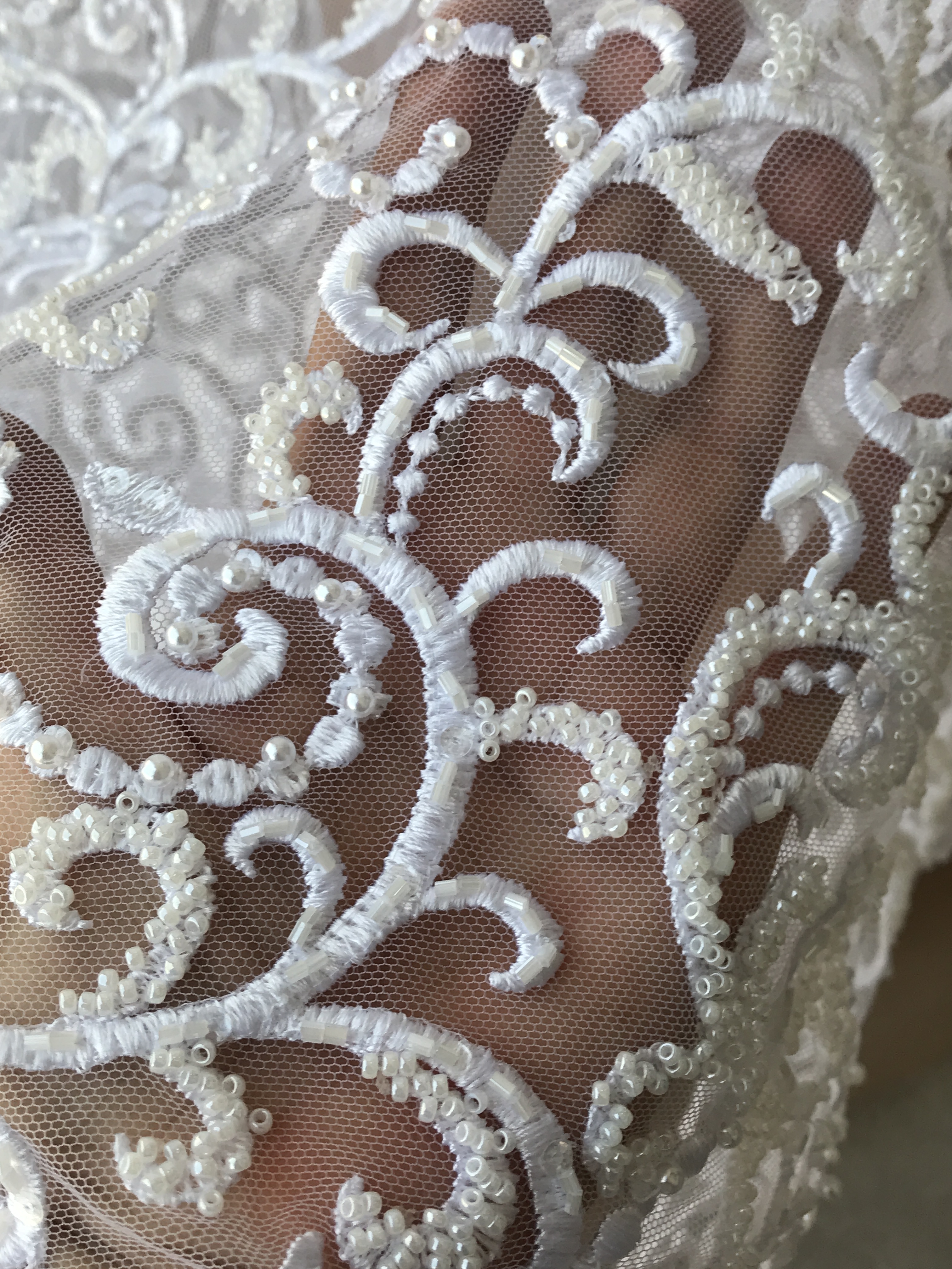 white beaded lace
